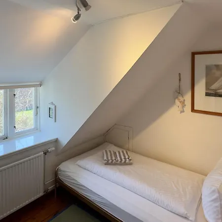 Dom wakacyjny Friesenhaus Amrum Friesenhaushaelfte *kloenschnack* *